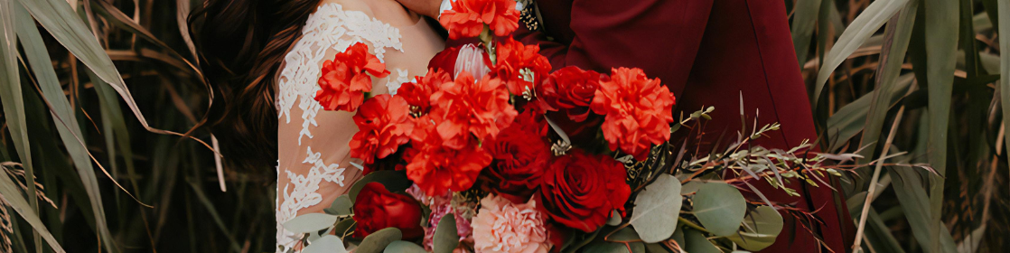 Red bridal bouquet of carnation flowers